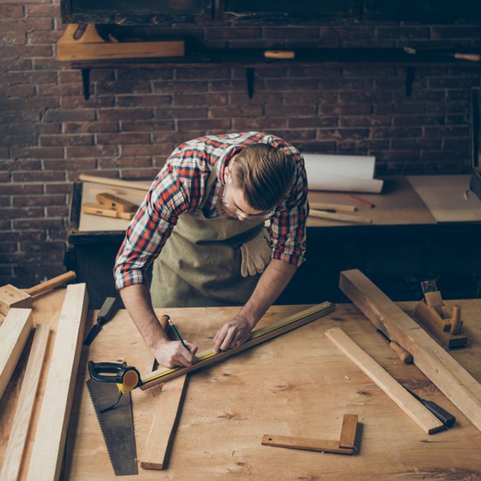 shutterstock_578729953 unfinished basement woodworking work shop